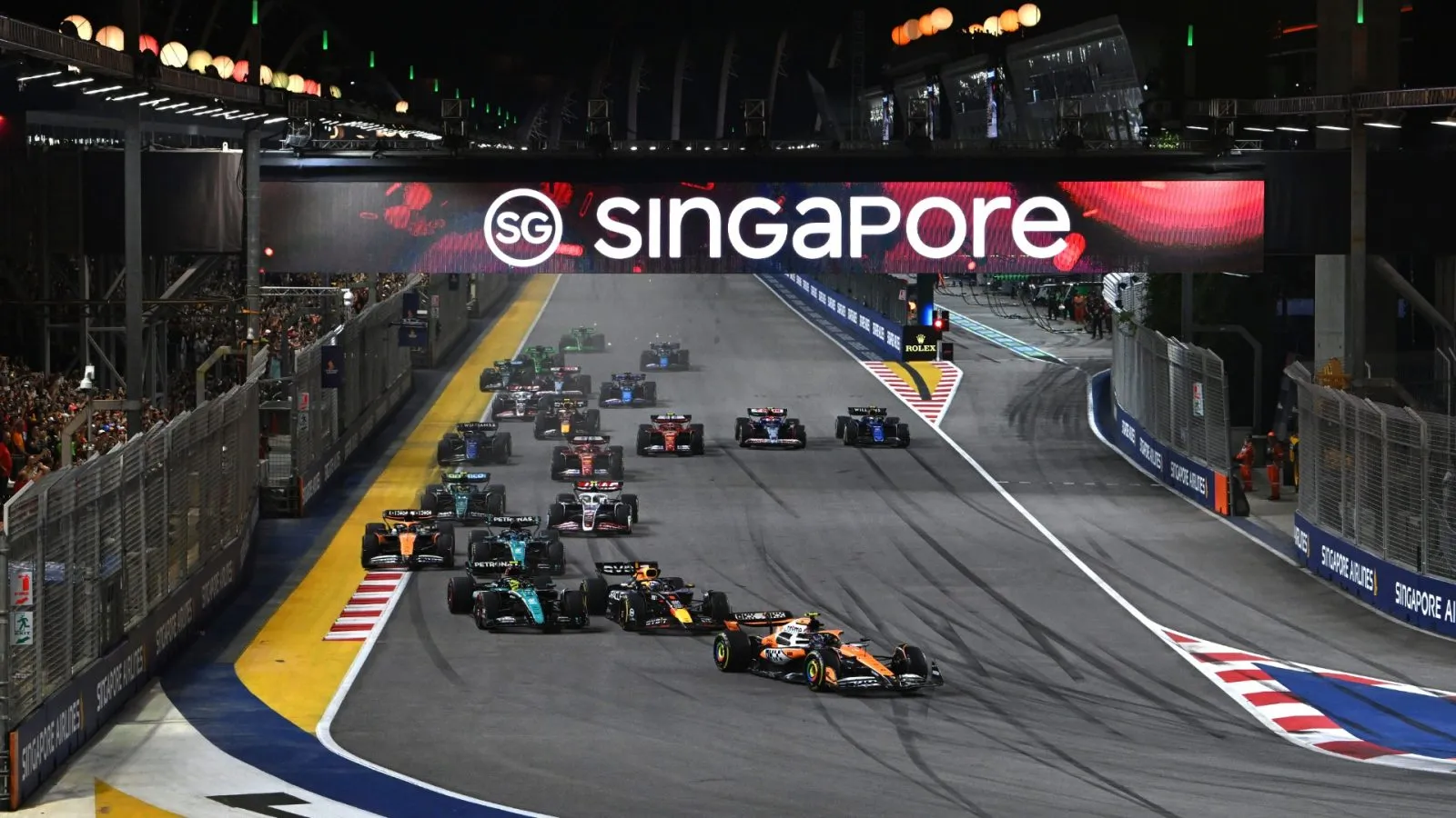 Formula 1 cars racing at night - The Singapore GP Experience