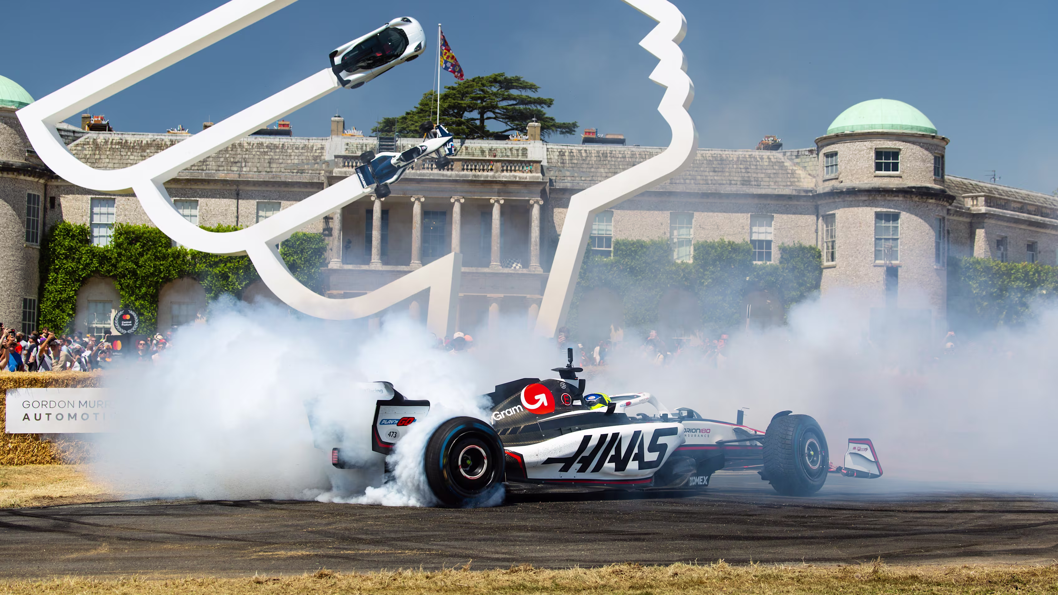 Formula 1 car drifting at event The Goodwood FOS Experience